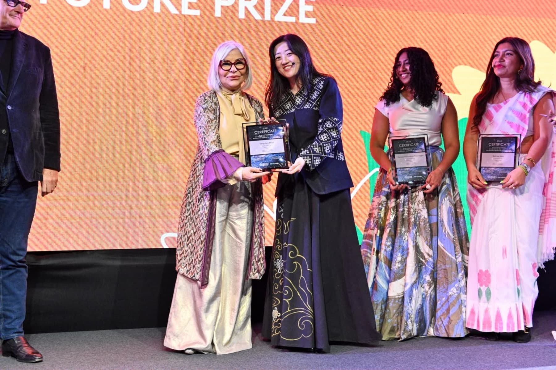 Receiving the award on stage