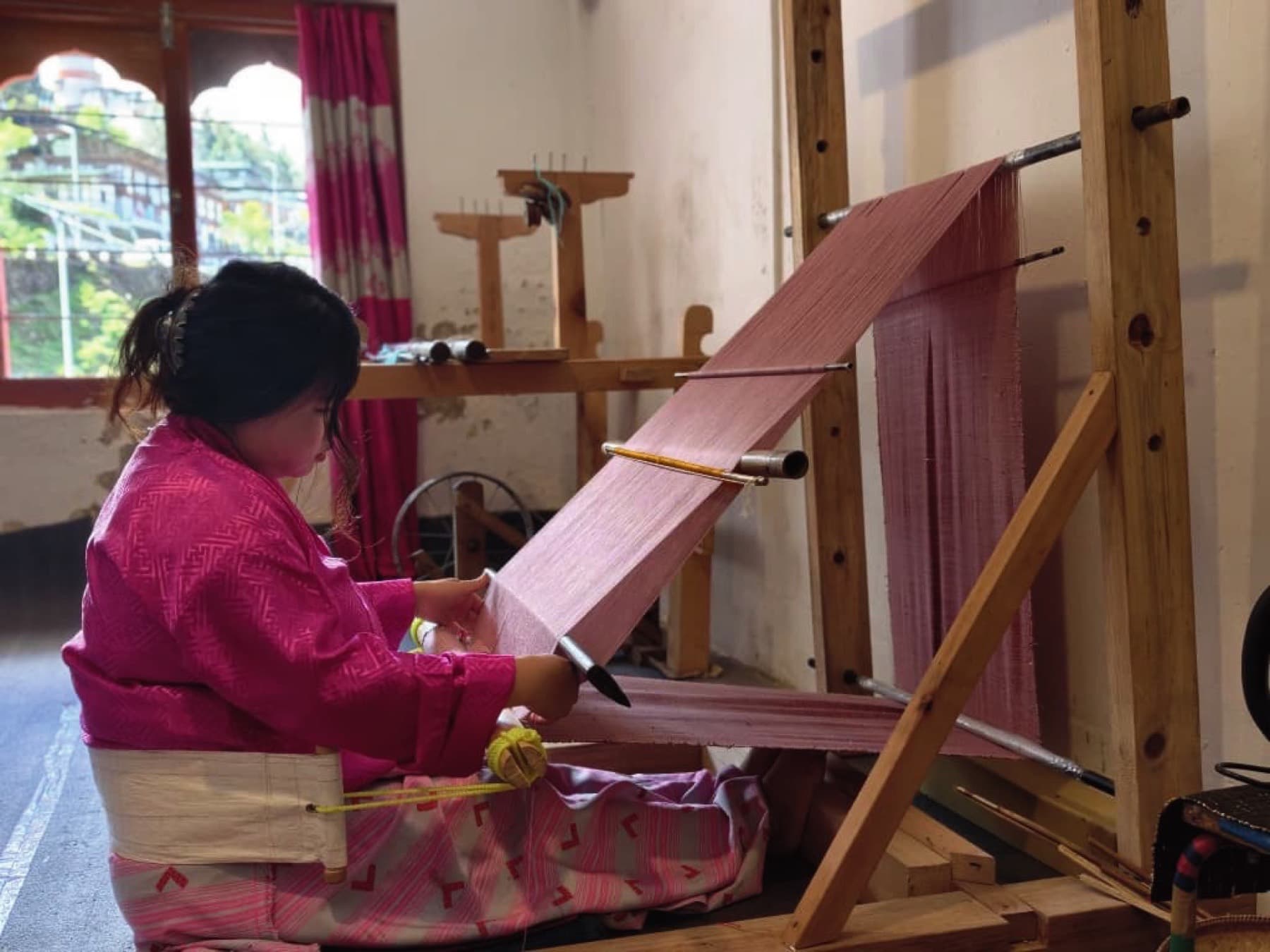 Weaving on Traditional Handloom